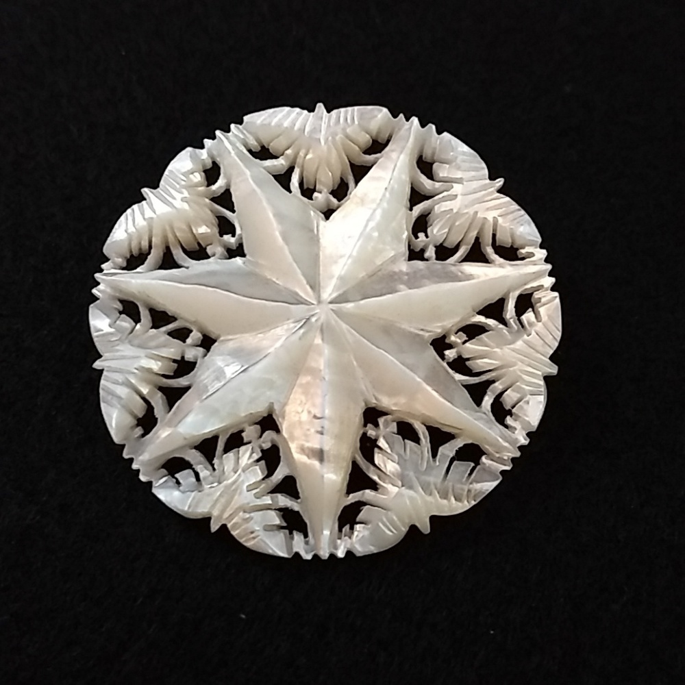 Vintage mother of pearl snowflake pin